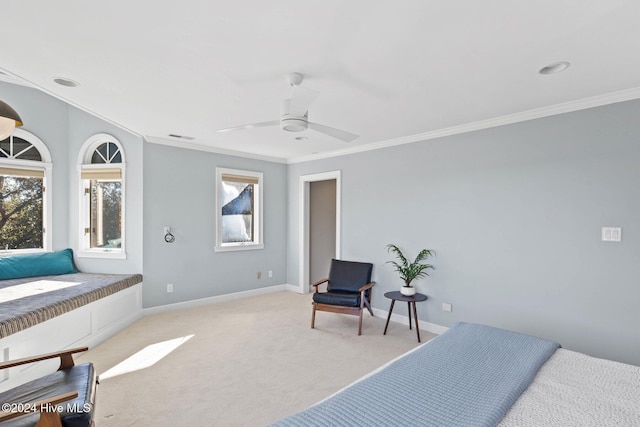 bedroom with ceiling fan, light colored carpet, and ornamental molding