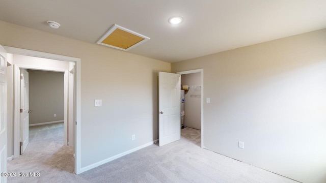 unfurnished bedroom featuring light colored carpet