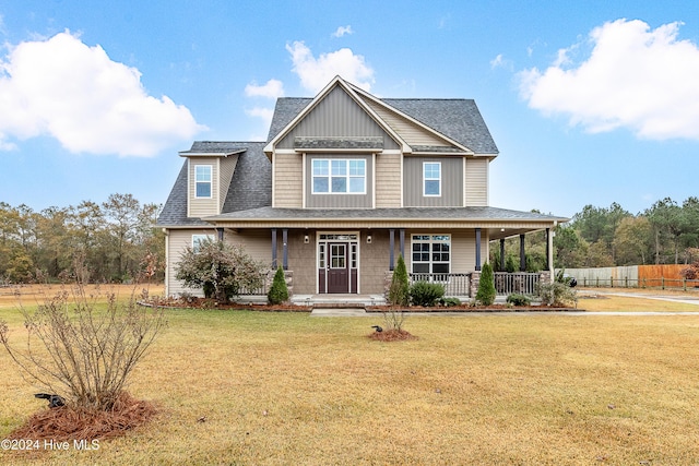 view of front of home featuring a porch and a front yard