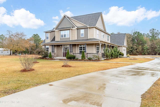 view of front facade featuring a porch and a front yard