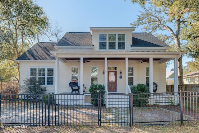 bungalow featuring a porch and ceiling fan