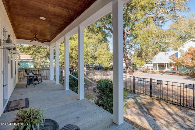 deck featuring ceiling fan and covered porch