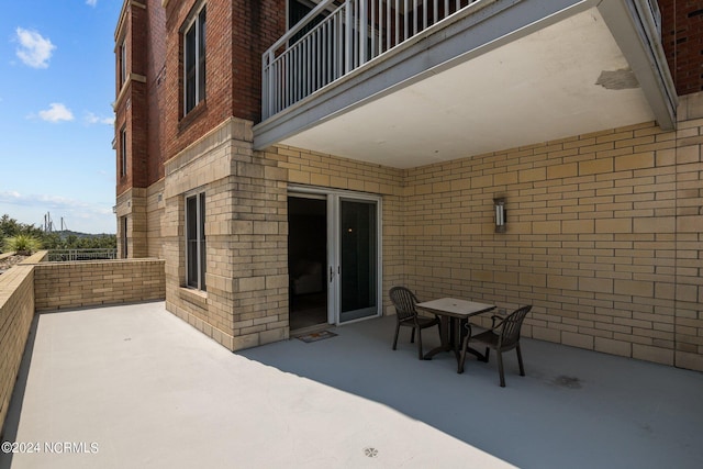 view of patio / terrace with a balcony