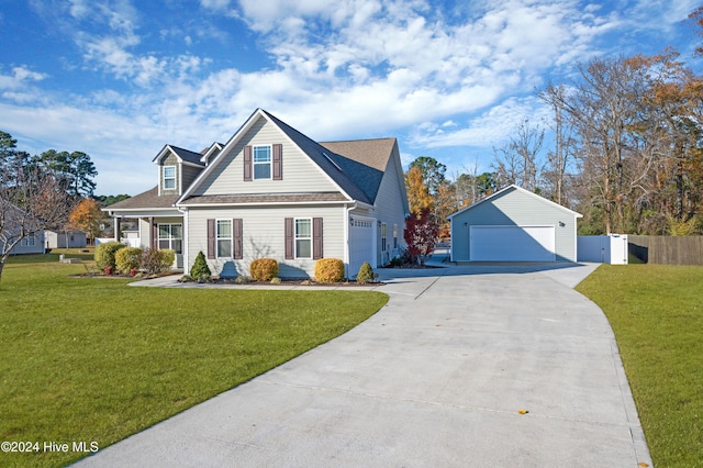 view of front of house with a garage and a front lawn