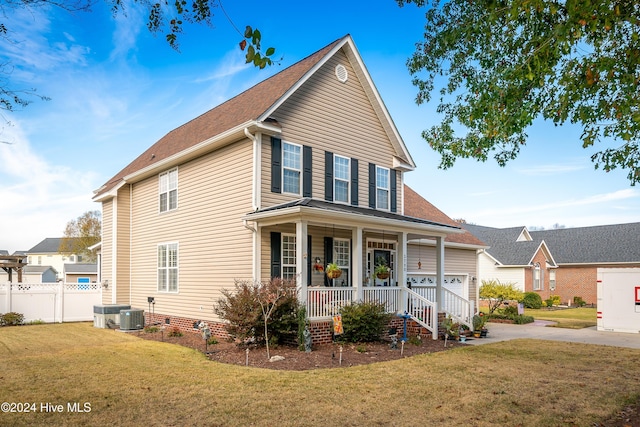 view of front of property featuring a front yard, a porch, and cooling unit