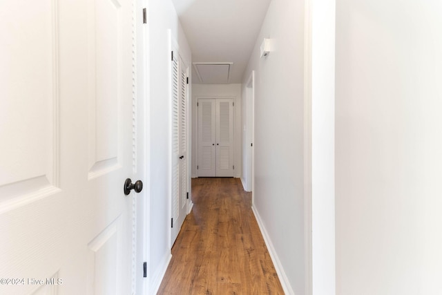 corridor featuring hardwood / wood-style flooring