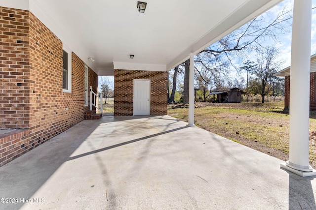 view of patio with a carport