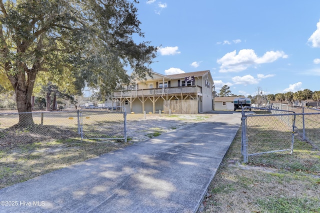 view of front of property featuring a wooden deck