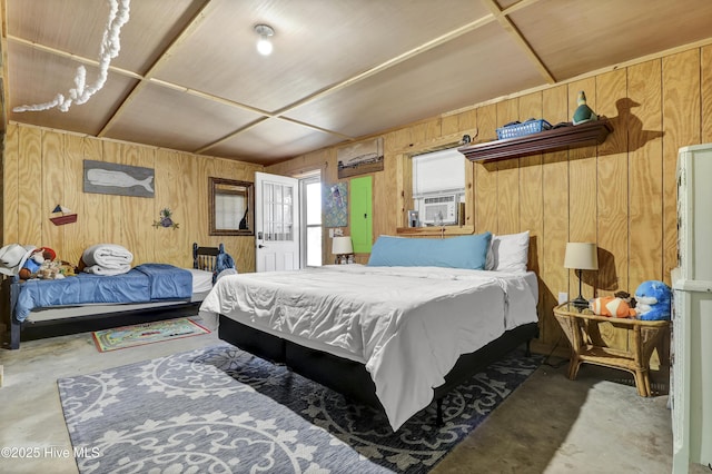 bedroom with cooling unit, concrete flooring, and wooden walls