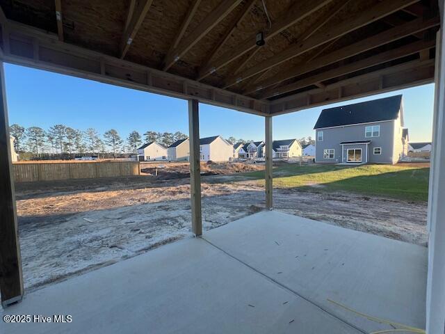 view of patio featuring an outbuilding