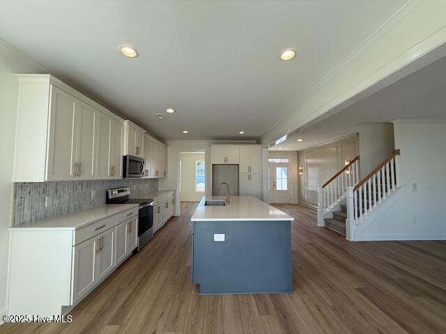 mudroom featuring crown molding