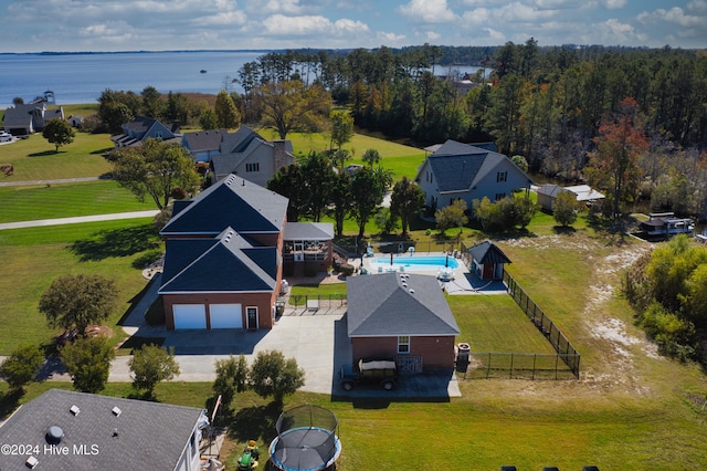 birds eye view of property featuring a water view