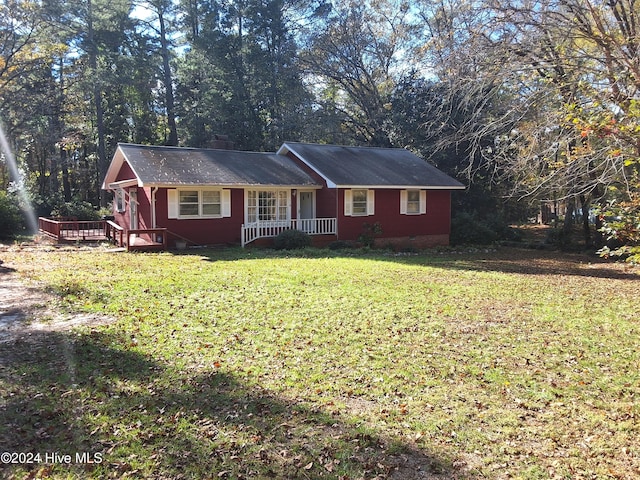 single story home with a front yard