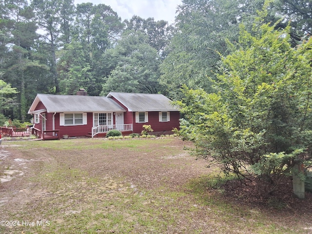 ranch-style house featuring a porch