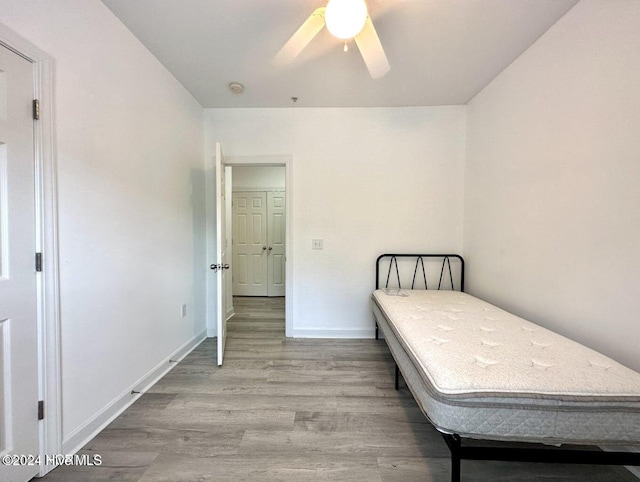 bedroom featuring ceiling fan and light wood-type flooring