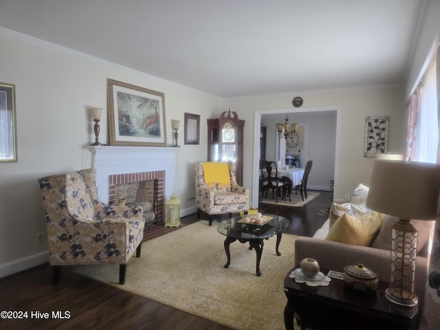 living room with a fireplace, wood-type flooring, and crown molding