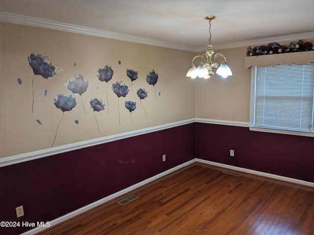 unfurnished room with a chandelier, wood-type flooring, and crown molding