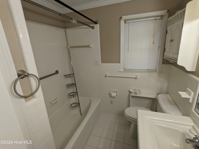 bathroom with tile patterned floors, toilet, shower / bathing tub combination, tile walls, and ornamental molding