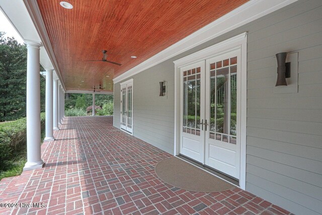 view of patio with ceiling fan and french doors