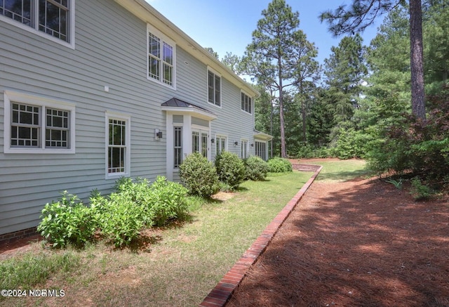 exterior space featuring a lawn