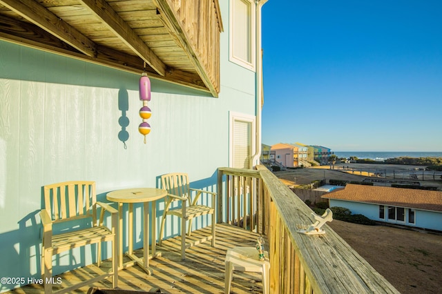 balcony featuring a water view