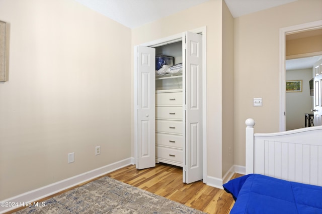 bedroom with light hardwood / wood-style flooring