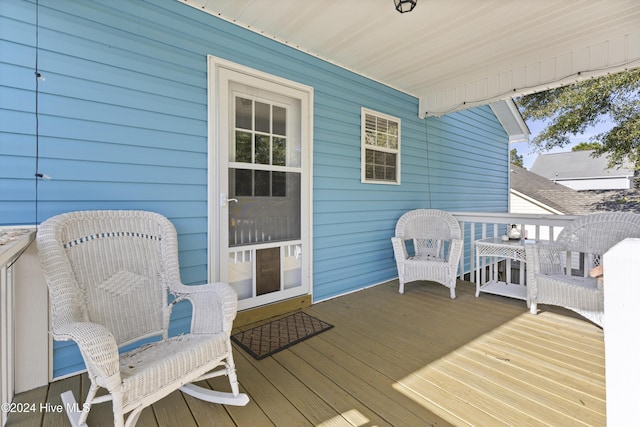 wooden terrace with covered porch