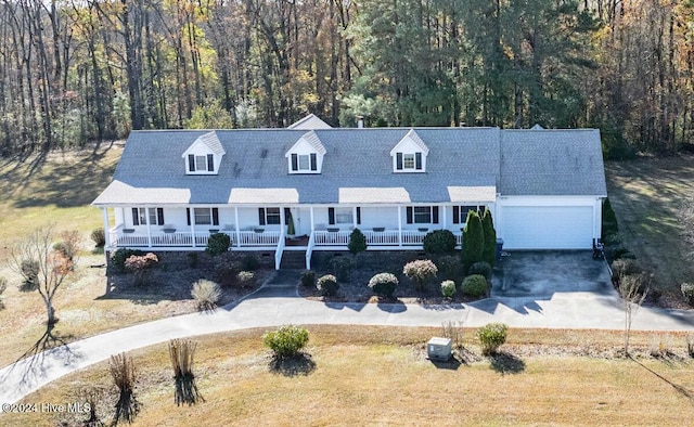 1148 Mill Field Rd, Bath, NC 27808 - cape cod-style house with covered porch, concrete driveway, a garage, and a front lawn