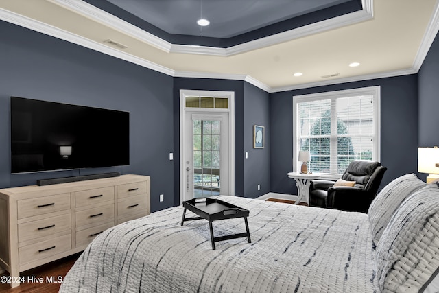 bedroom featuring crown molding, multiple windows, and access to outside