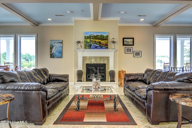 tiled living room with a wealth of natural light and ornamental molding