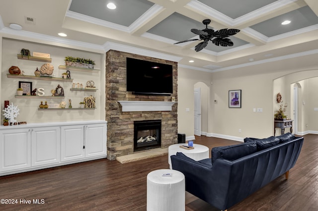 living room with a stone fireplace, beamed ceiling, crown molding, coffered ceiling, and dark hardwood / wood-style floors