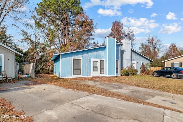 exterior space with a front lawn