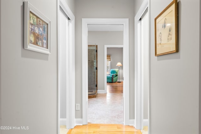 hallway featuring hardwood / wood-style floors