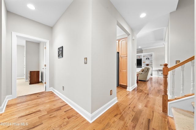 corridor featuring light hardwood / wood-style floors