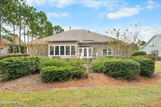 back of house featuring french doors