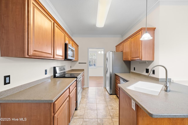 kitchen featuring sink, hanging light fixtures, ornamental molding, appliances with stainless steel finishes, and light tile patterned flooring