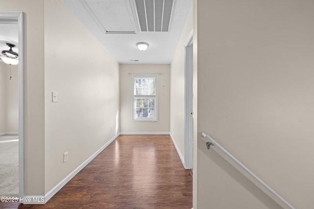 corridor featuring wood-type flooring