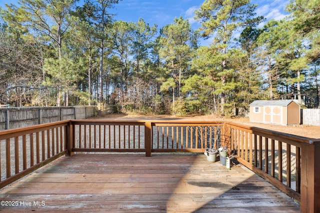 wooden deck with a shed