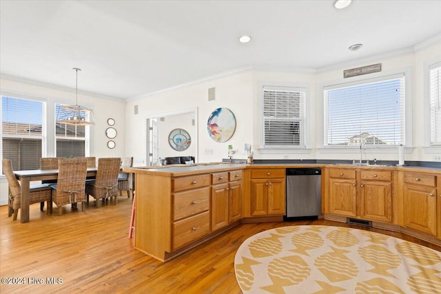 kitchen featuring sink, light hardwood / wood-style flooring, stainless steel dishwasher, pendant lighting, and ornamental molding