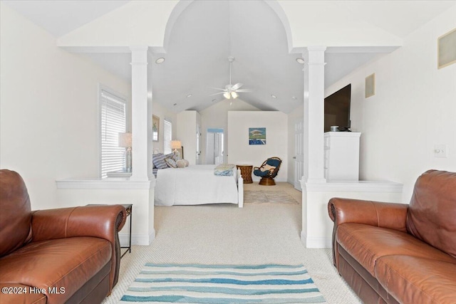 bedroom with ornate columns, ceiling fan, light colored carpet, and lofted ceiling