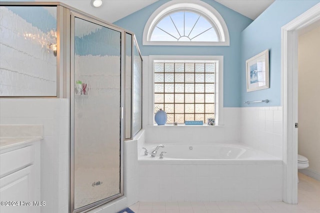 full bathroom with tile patterned floors, vanity, toilet, and independent shower and bath