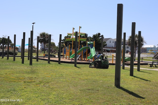 view of play area featuring a lawn