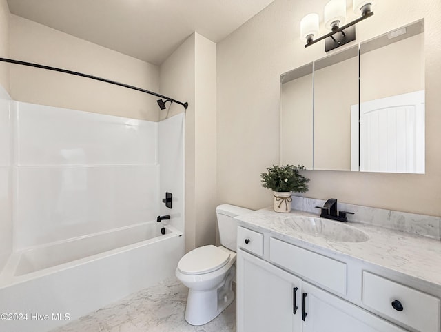 full bathroom with bathing tub / shower combination, vanity, and toilet