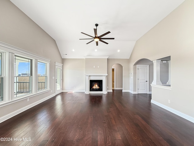 unfurnished living room featuring ceiling fan, dark hardwood / wood-style flooring, and high vaulted ceiling