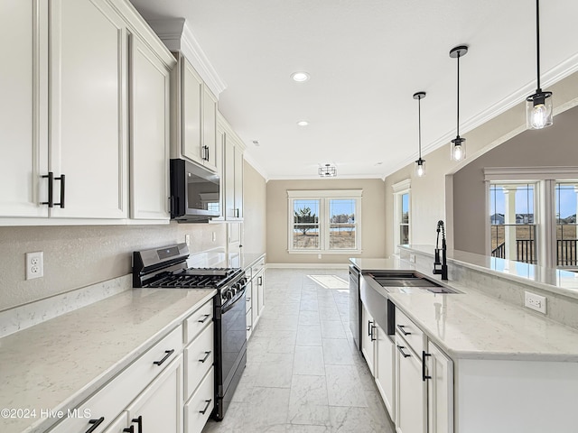 kitchen featuring light stone countertops, ornamental molding, decorative light fixtures, white cabinetry, and stainless steel appliances