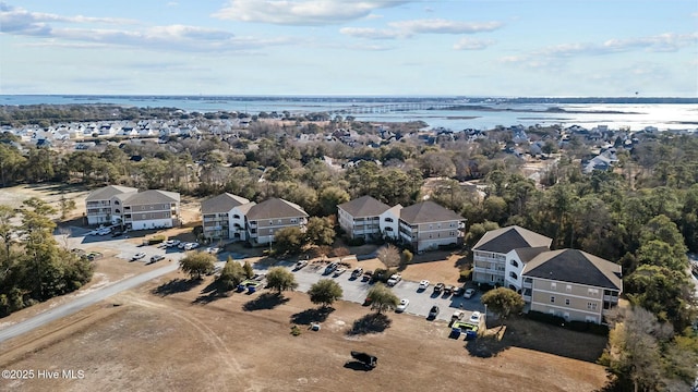 drone / aerial view with a water view