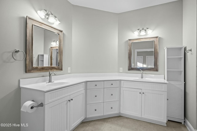 bathroom with tile patterned flooring and vanity