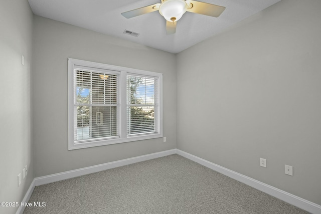 unfurnished room with carpet floors and ceiling fan