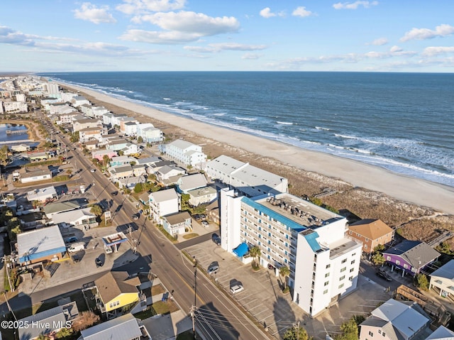 aerial view featuring a water view and a view of the beach