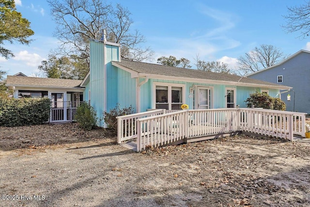 view of front of house with a deck